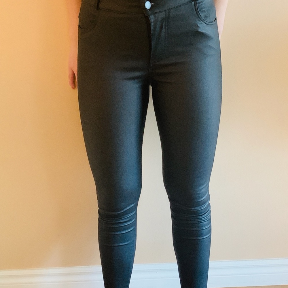 Women’s black faux leather jeans